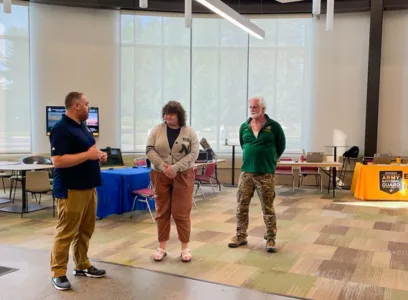 MVAA presents Coin of Excellence to NMU veteran advocate, hosts Benefits Boot Camps